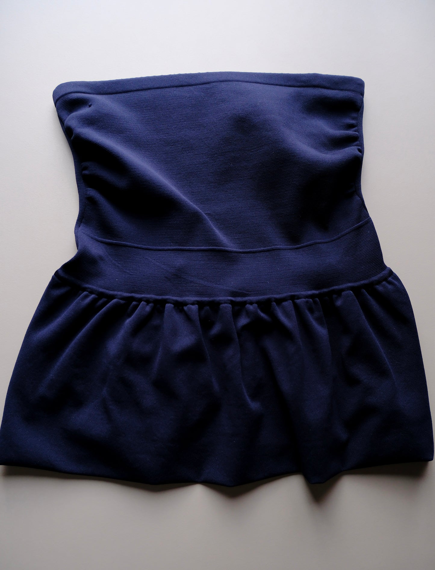 LÖWER 26ss / 18G smooth peplum bare top